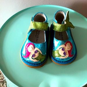 Wee squeak baby girl shoes.